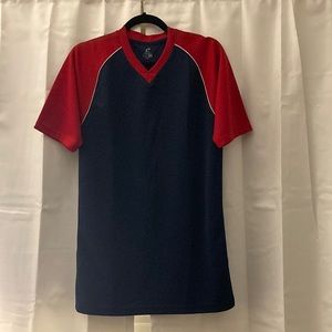 Jersey like shirt. Navy blue with red sleeves.